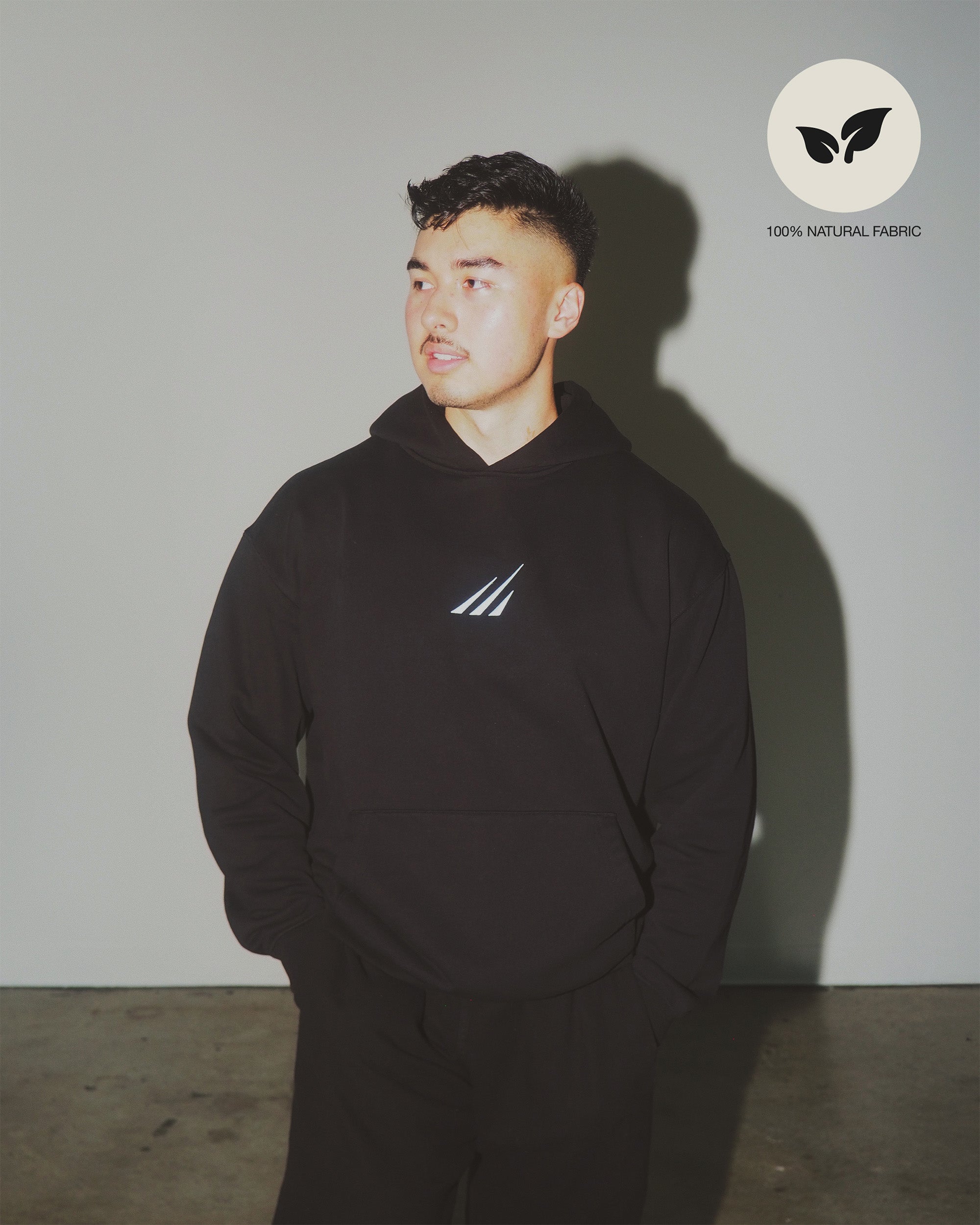 Organic cotton hoodie in black – sustainable activewear