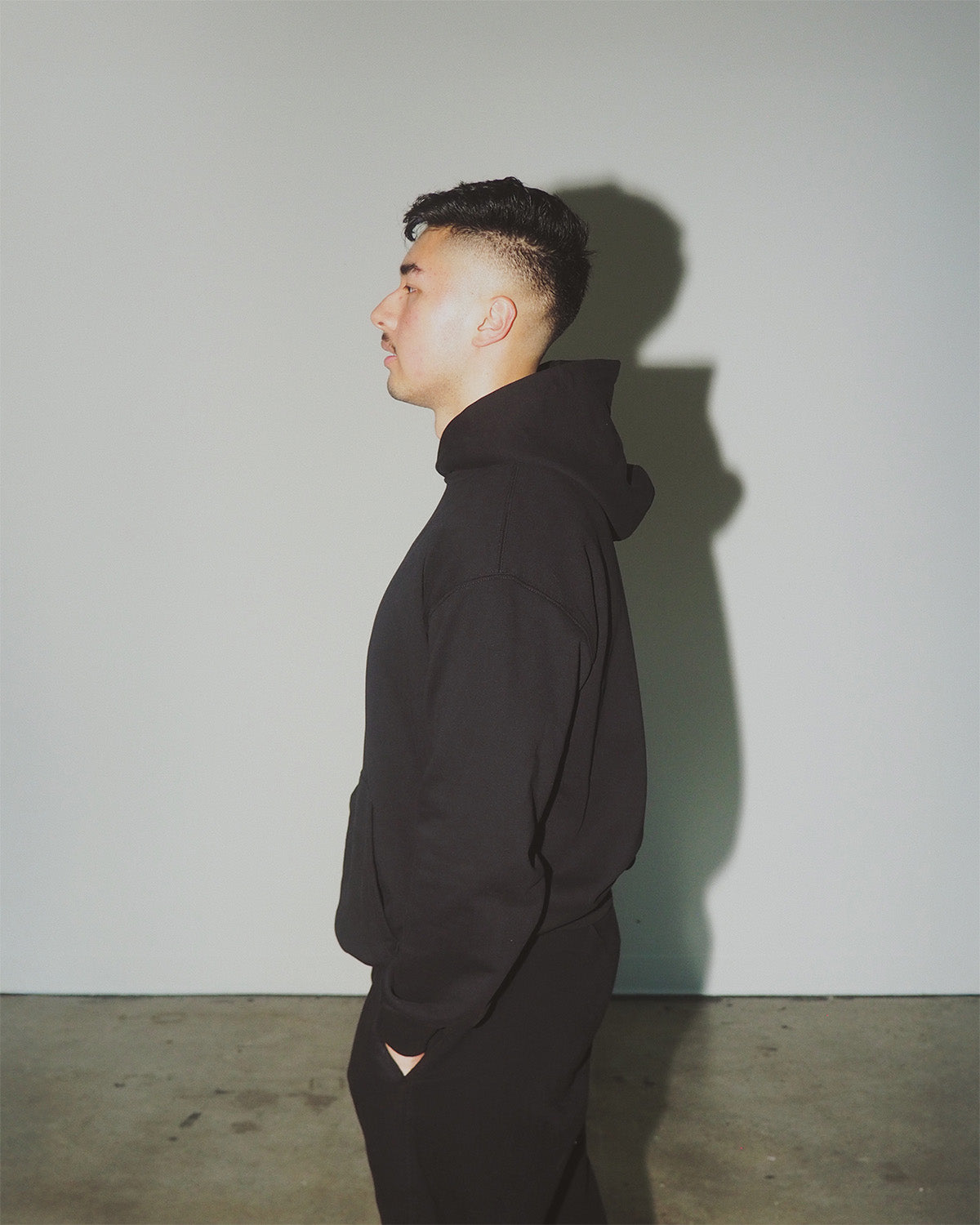 Premium men’s 100% cotton athletic hoodie, toxin-free.