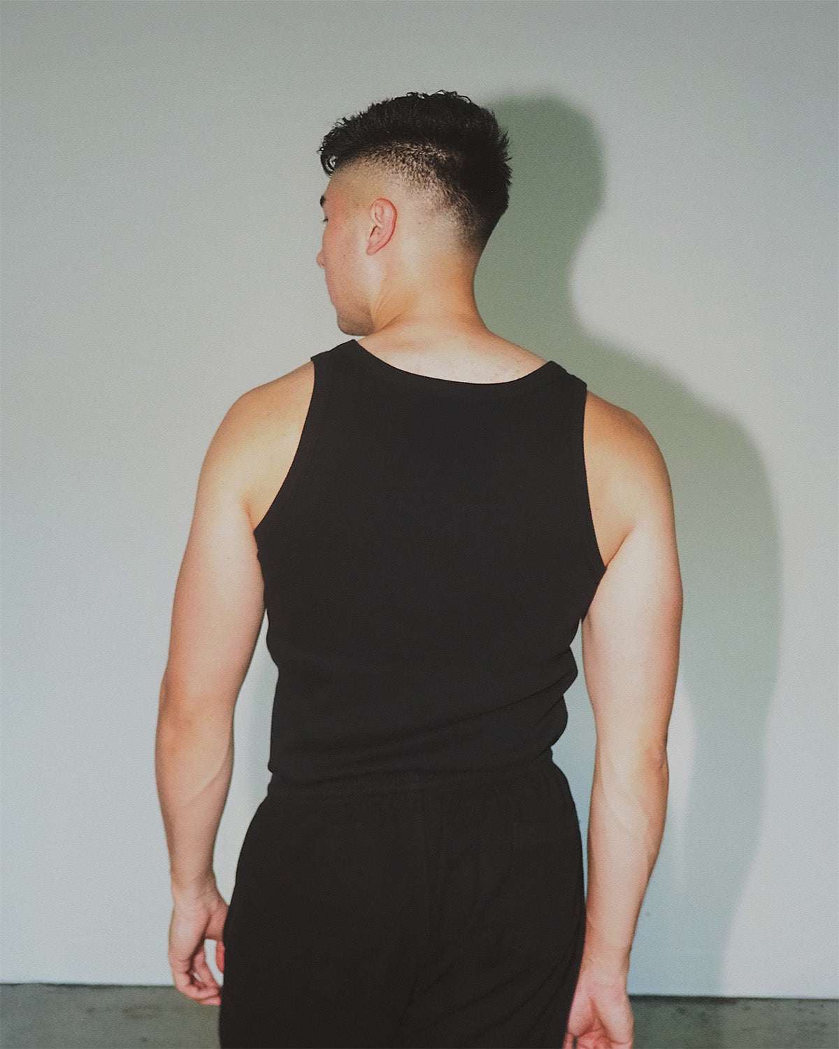 Premium men’s cotton tank, toxin-free athletic apparel.