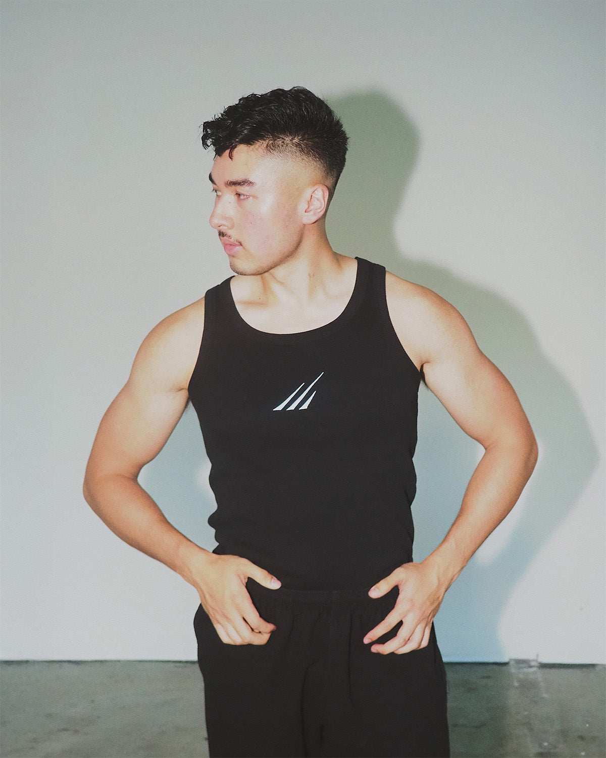Grizz embroidered cotton muscle tank – eco-friendly workout top