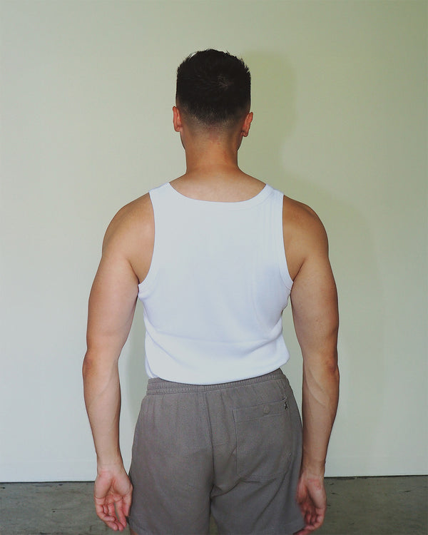 Natural men’s gym tank, made with organic cotton fibers.