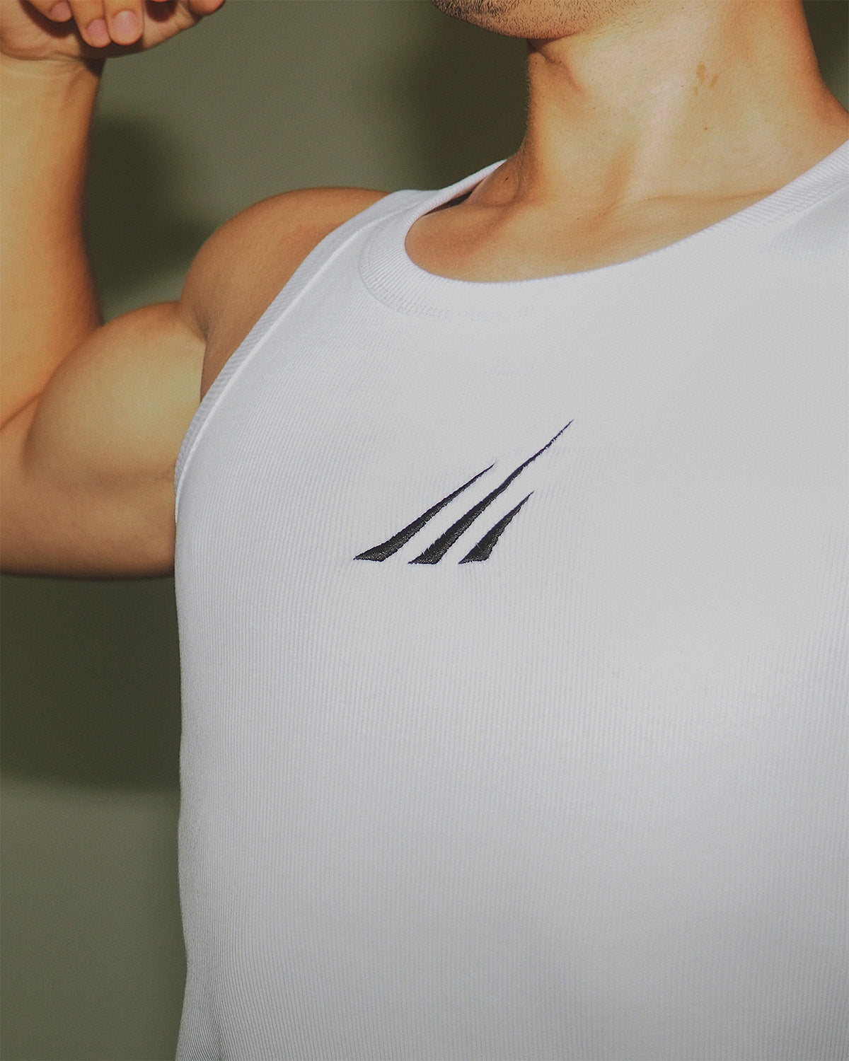Breathable men’s cotton workout tank for performance training.