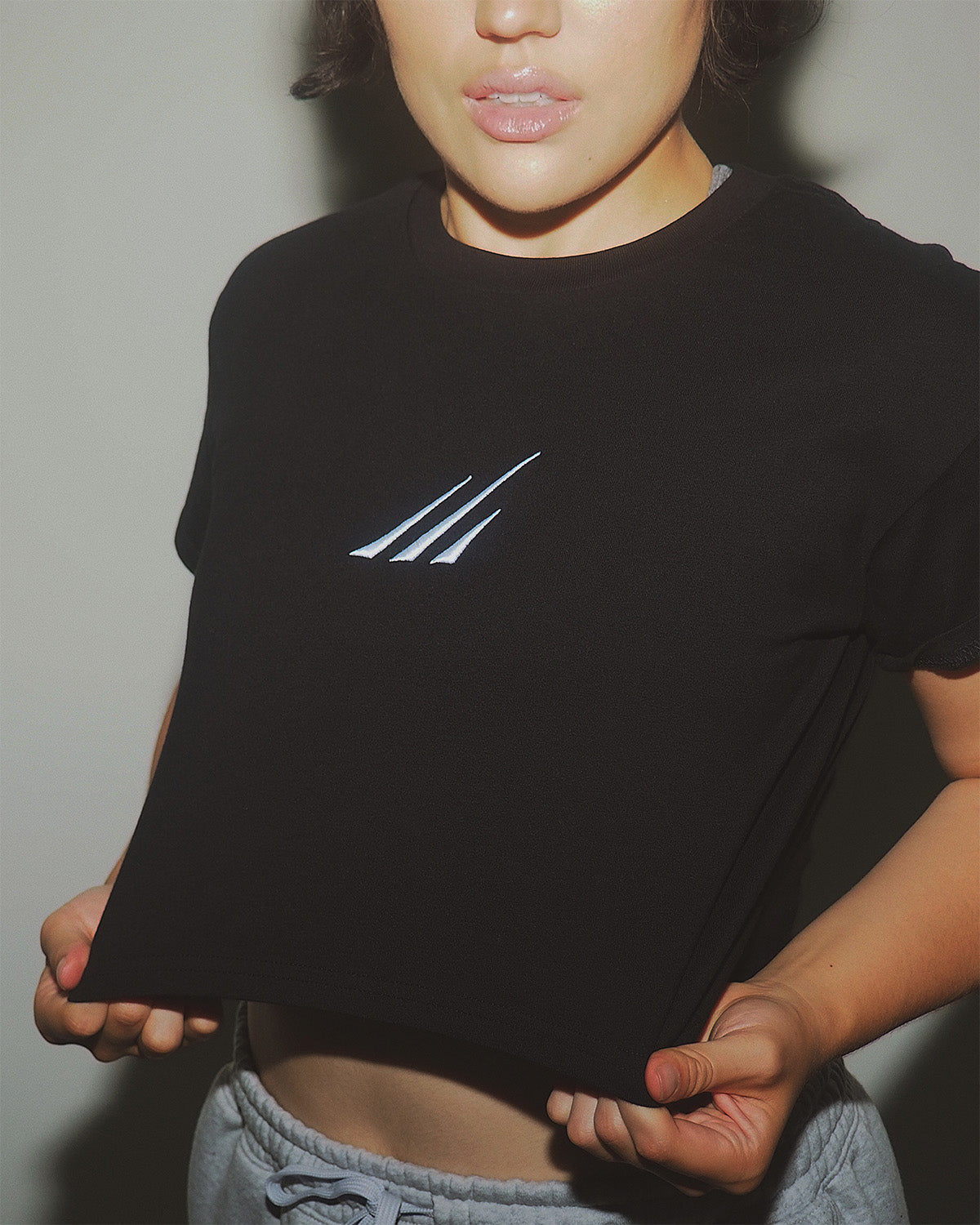 Women’s cropped cotton performance tee, toxin-free fabric.