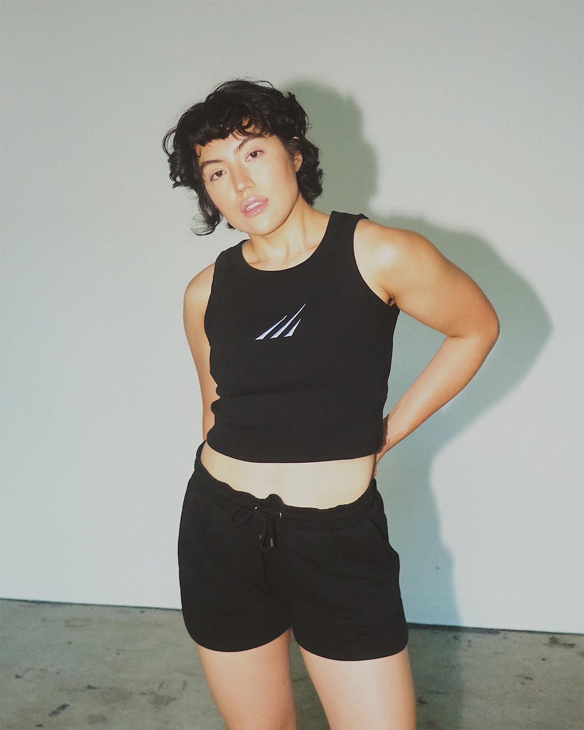 Grizz embroidered cropped tank in black – eco-friendly workout clothing