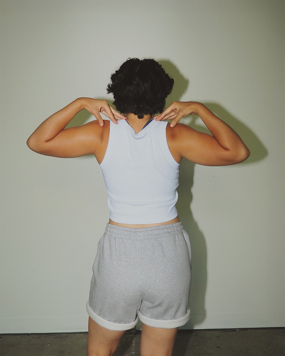 Women’s toxin-free organic cotton cropped activewear tank.