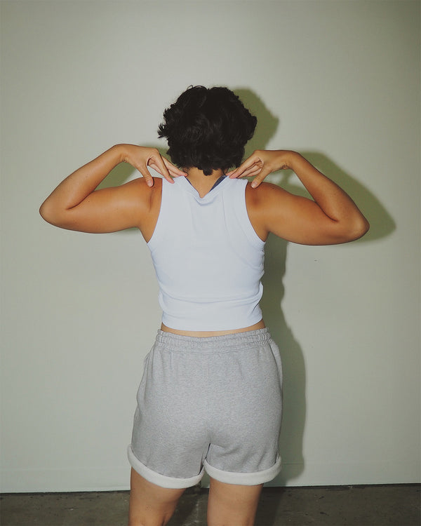 Women’s toxin-free organic cotton cropped activewear tank.