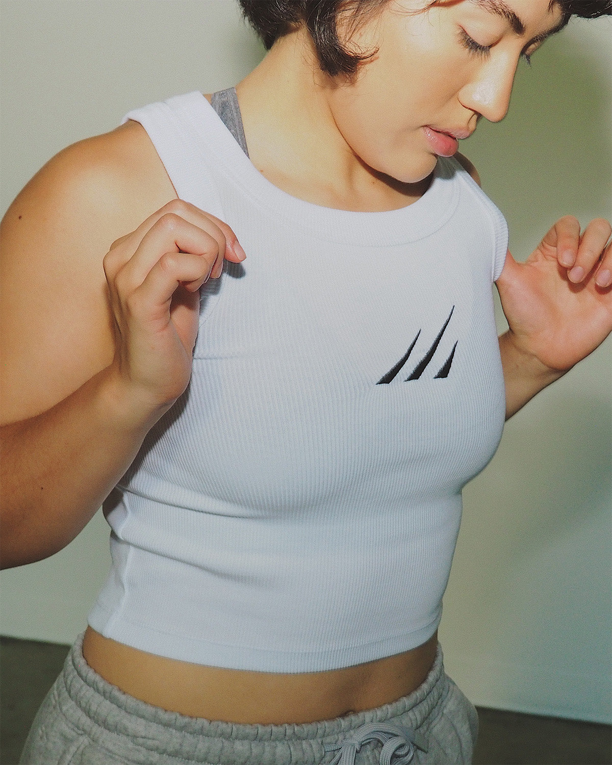 Sustainable women’s cropped tank for workouts and training.